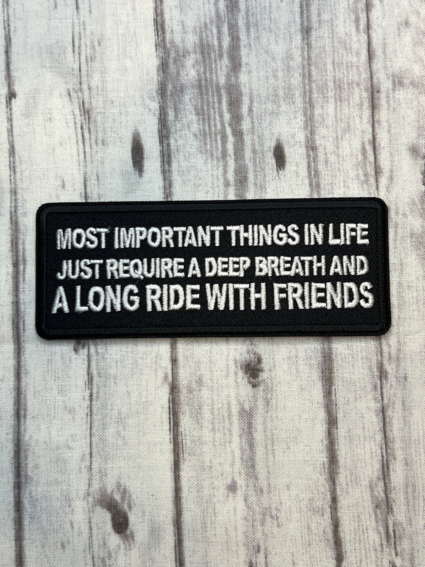 Most important things in life just require a deep breath and a long ride with Friends iron on patch