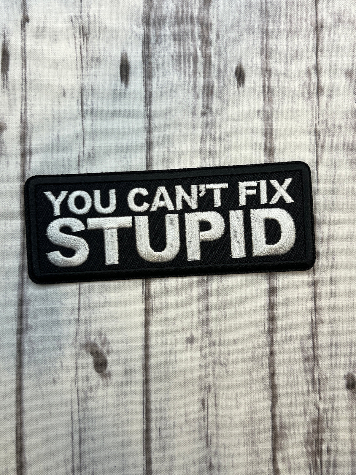 You can’t fix stupid iron on patch