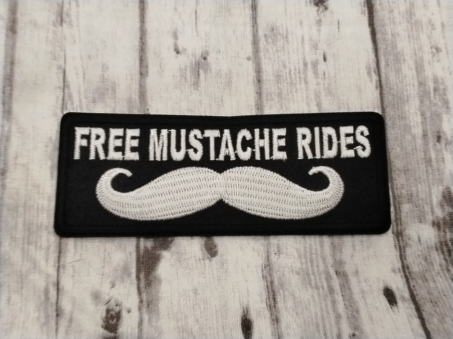 Free mustache rides patch